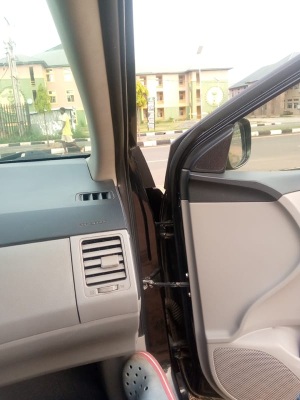 Morning street scenes documented near medical facilities from vehicle