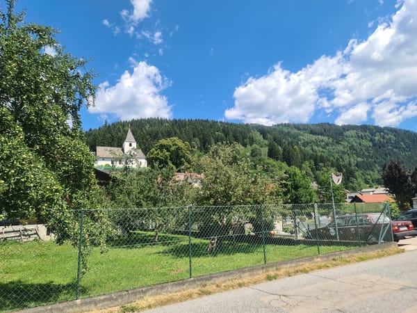 Street-level views of Feldkirchen in Kärnten on a clear summer morning