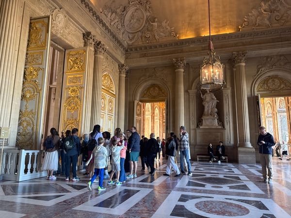 Ornate Palace of Versailles interior documented by witness