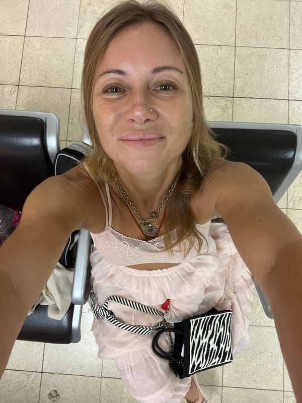 Pink dress, airport terminal, selfies and twirling in Katunayake