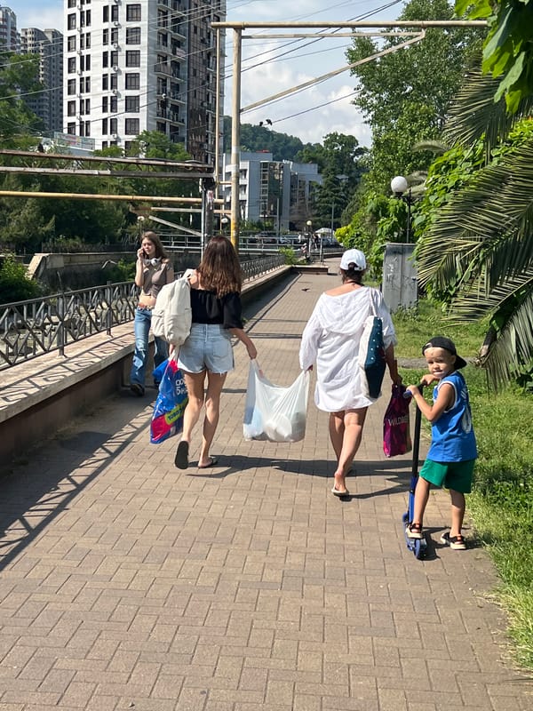 Summer afternoon life unfolds across Sochi's streets and beaches