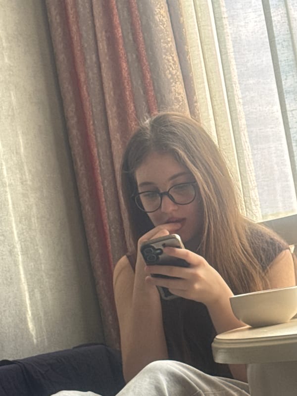 Woman takes selfies in Tbilisi apartment