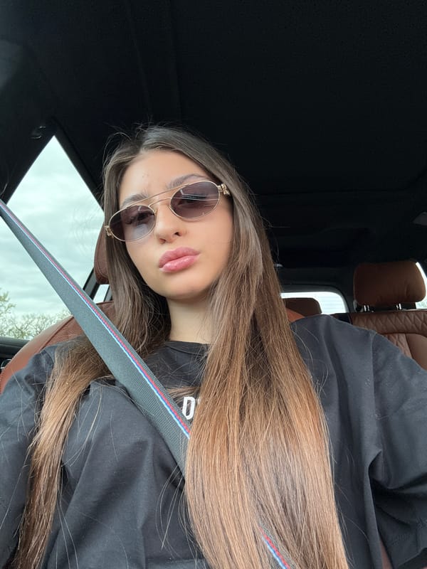 Woman observed in car wearing sunglasses in Novi han