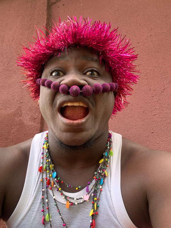 Festive celebration with pink headdresses documented in Akwanga Nigeria