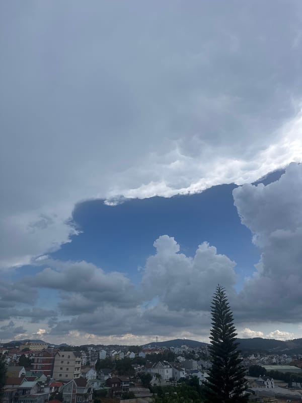 Storm clouds gather over Da Lat, Vietnam during morning hours