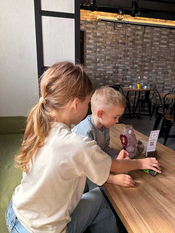 Woman and child share moment at Mukachevo café