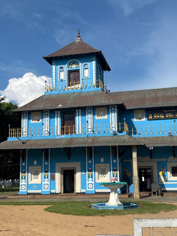 Tourist documents Buddhist and Hindu temples in Dondra, Sri Lanka