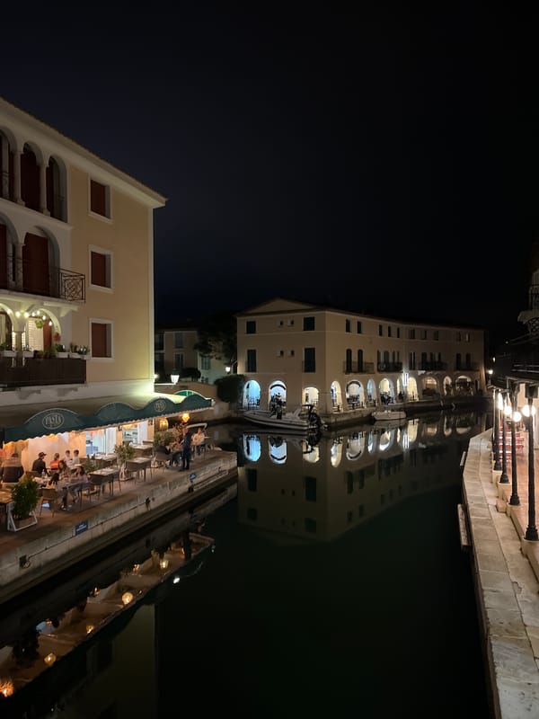 Woman takes beach selfie in Grimaud, France