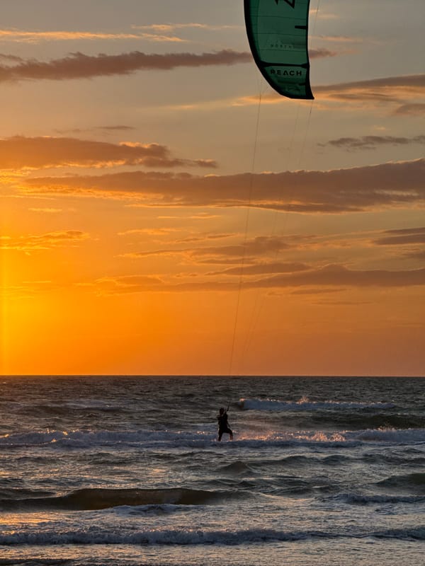 Kitesurfer spotted at sunset off Shchelkino, Ukraine coast