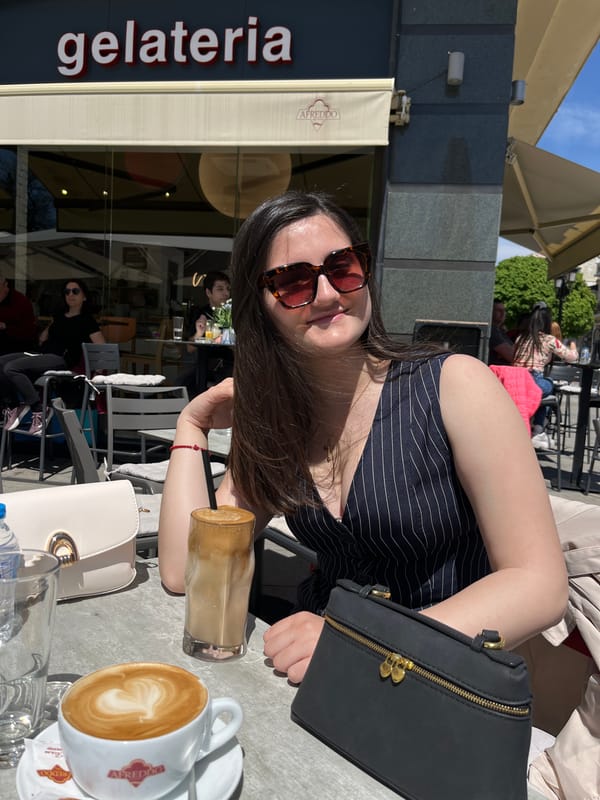 Woman enjoys sunny morning at Plovdiv cafe