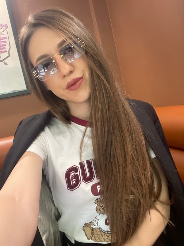 Woman documents casual afternoon stroll through central Sofia cafes, squares