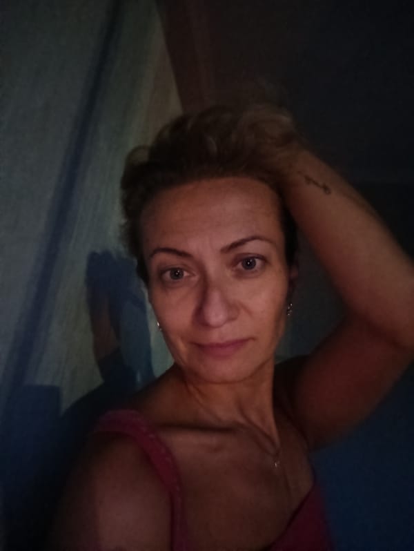 Evening selfie series from a Moscow apartment, July 2026