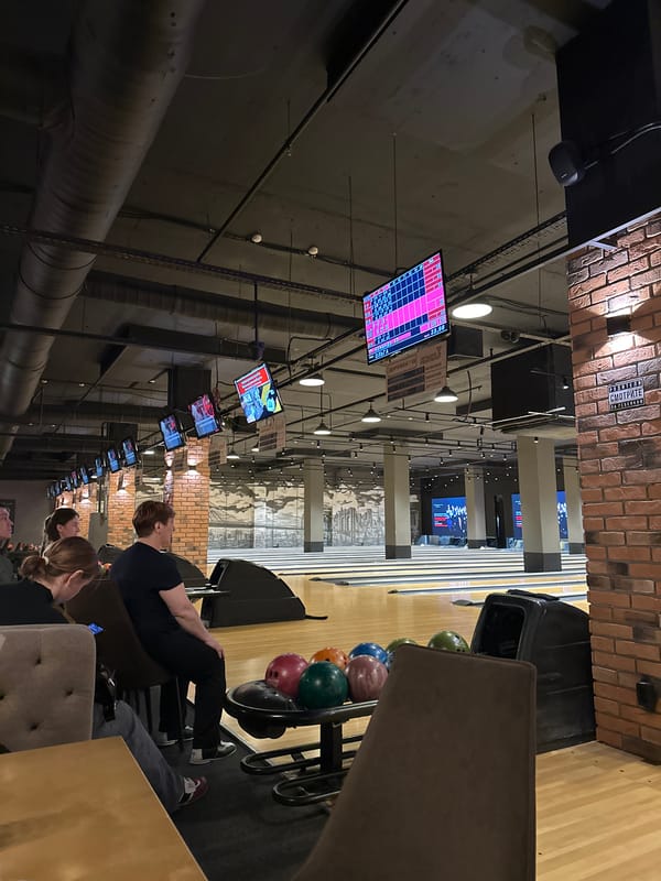 Woman enjoys bowling and dining at Izhevsk recreation center