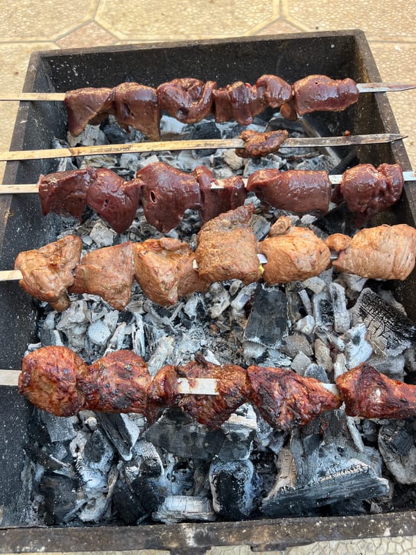 Outdoor barbecue cooking session documented in Kaspiysk, Russia