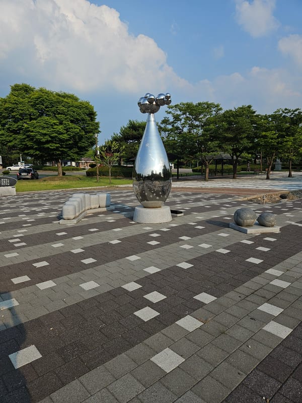 Morning stop at a traditional Korean pavilion and sculpture park