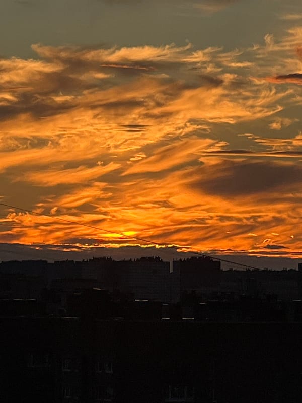 Vivid summer sunset over a Russian residential cityscape