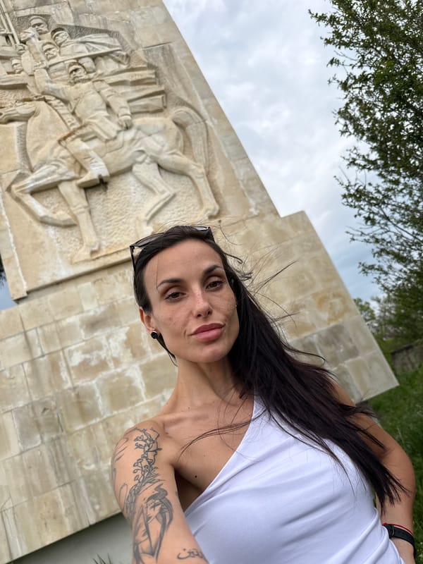 Woman Takes Selfie at Historical Monument in Pleven