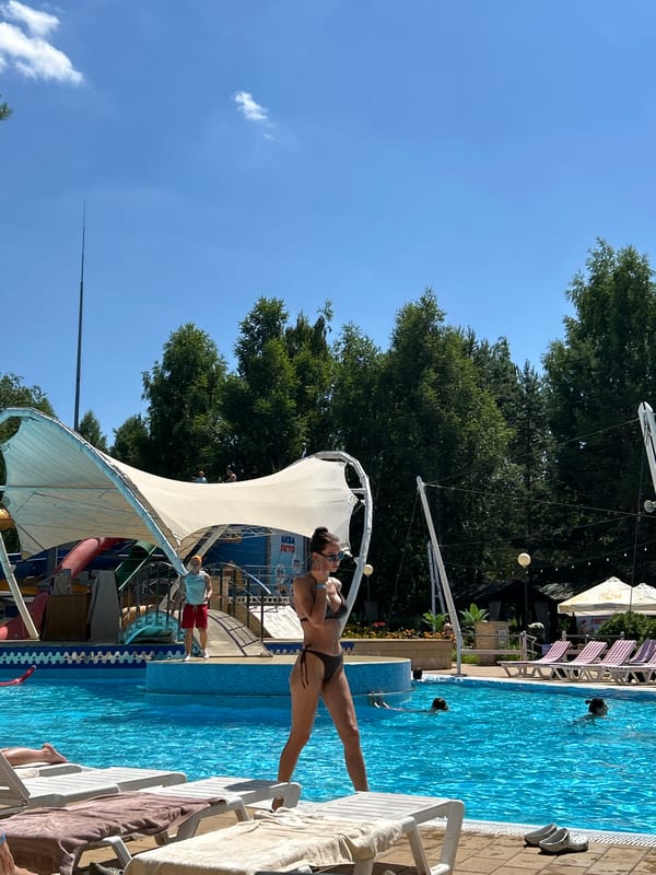 Busy summer day at an outdoor pool in Togliatti