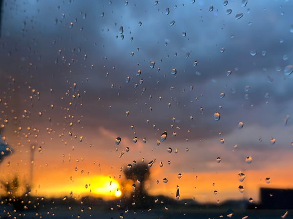 Storm clouds and vivid sunset light over Taganrog