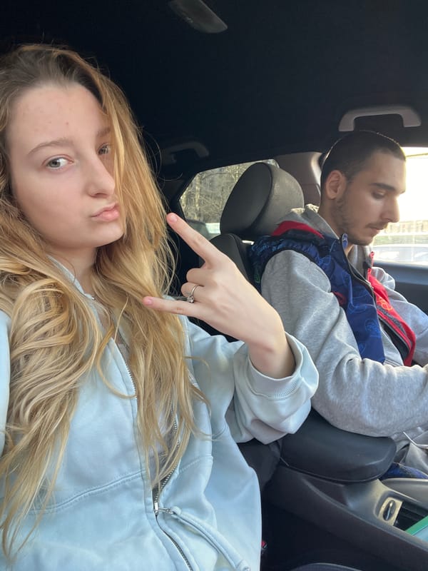 Two young adults travel through downtown Varna streets