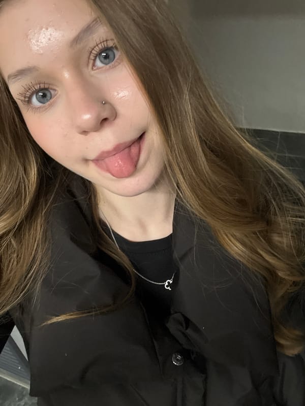 Woman poses for multiple portraits in Yekaterinburg