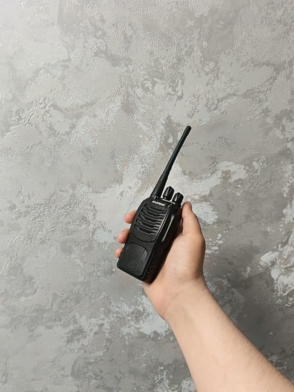 Young man photographs himself with objects in Andreyevo interior