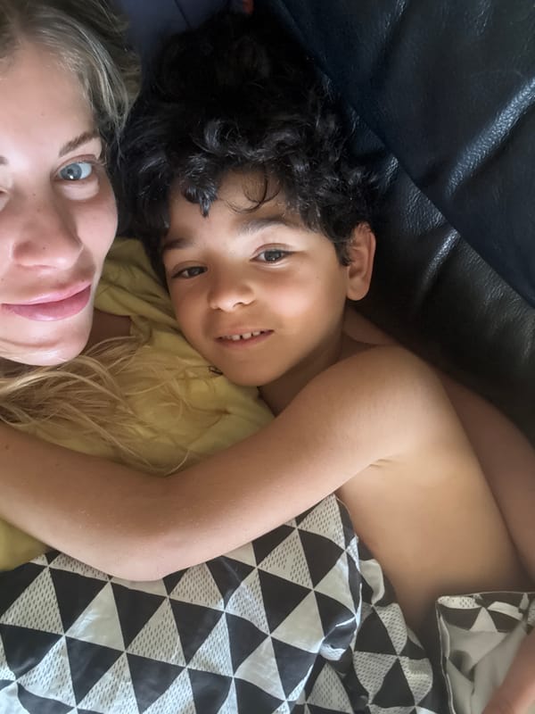 Adult and child share quiet moment in Rousset