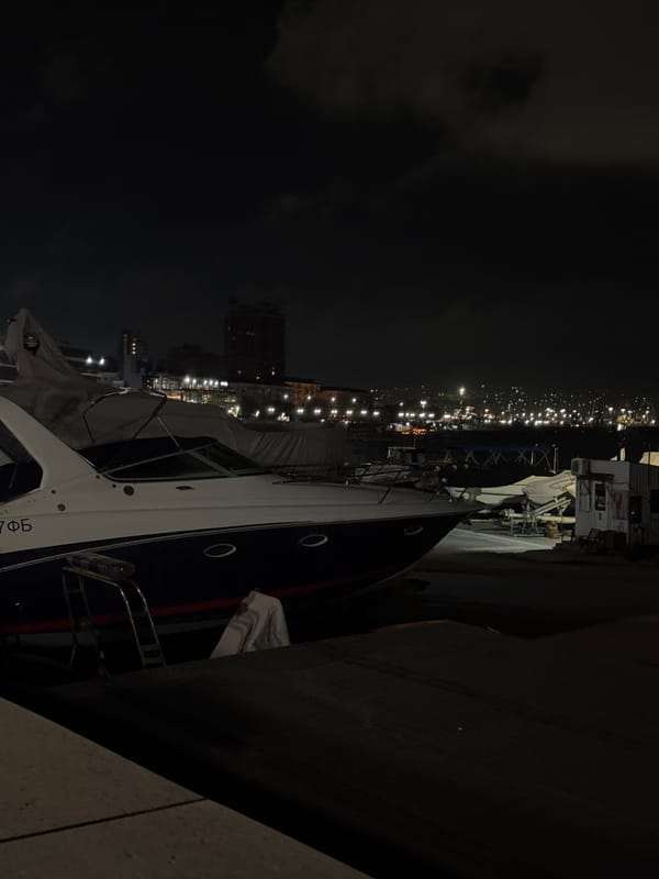 Yacht and carnival lights captured in Novorossiysk evening