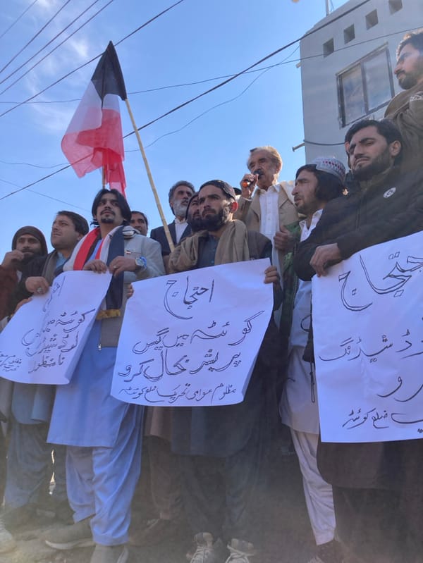 Men stage protest with Urdu signs in Quetta, Pakistan