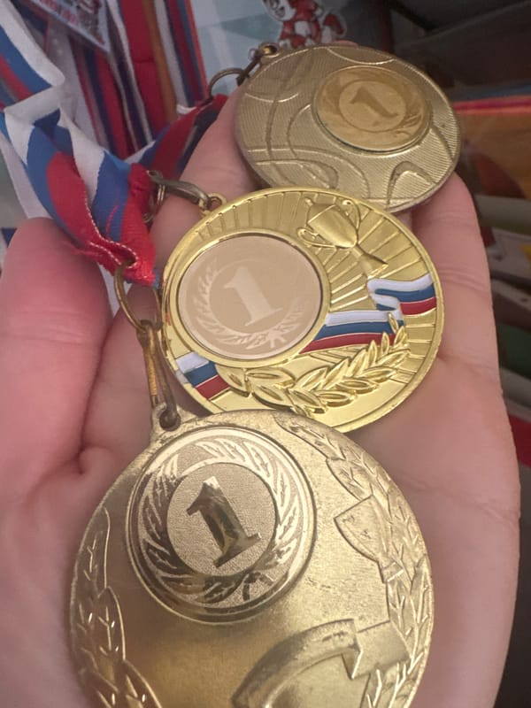 Votkinsk resident captures medals, woman in pink jacket, feeding pigeons