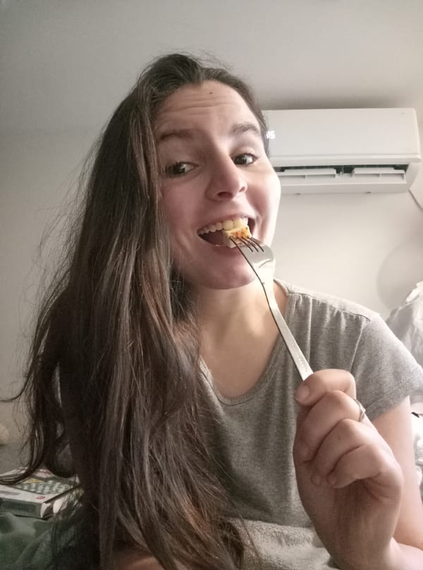 Woman enjoys wine and board games during evening in Burgas