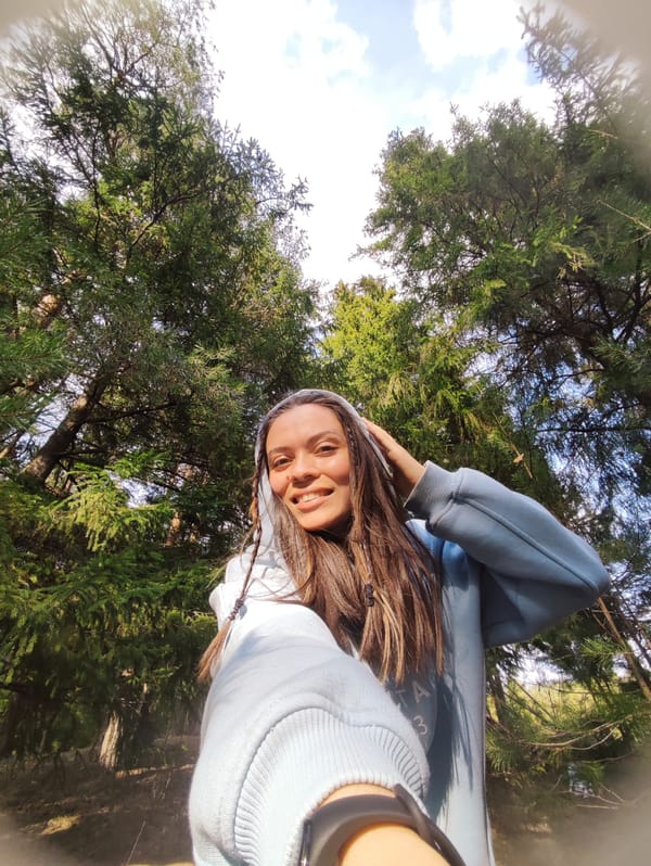 Woman takes forest selfies in Фоки, Russia