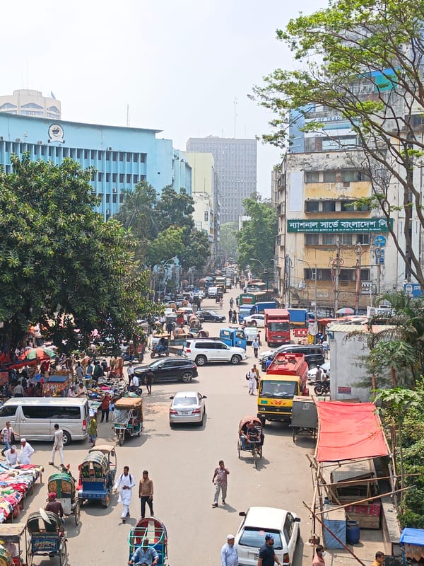 Morning street market activity documented across central Dhaka