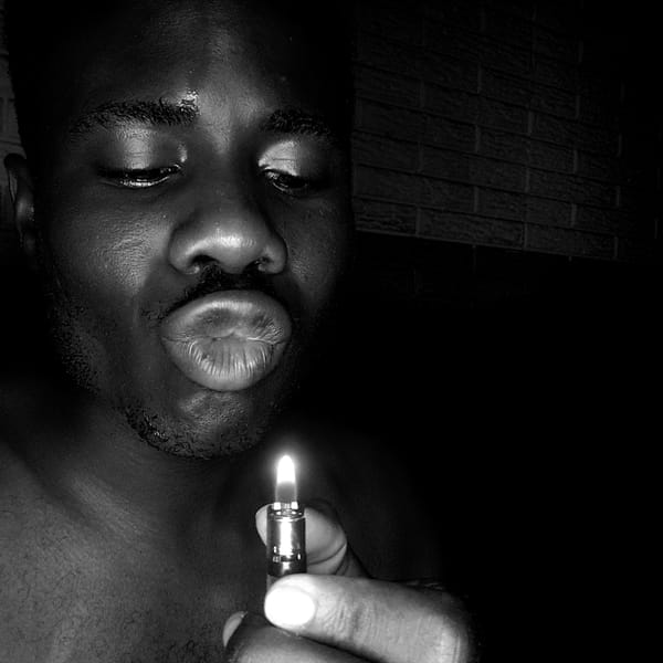 Person photographed with lighter in Narayi, Nigeria