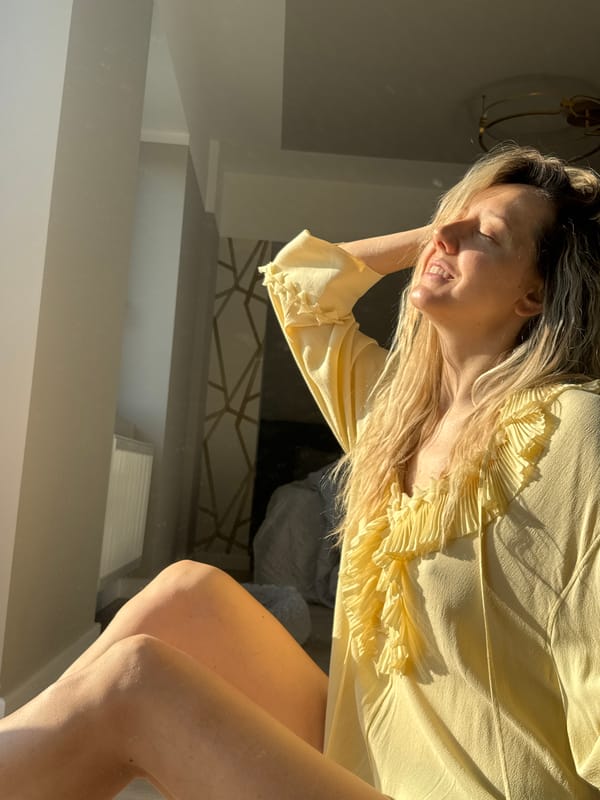 Woman takes morning selfies in Carnikava home studio setup