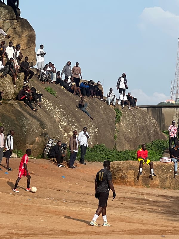 Afternoon life in Jos, football and rocky landscapes