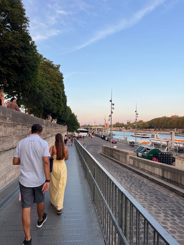 Evening stroll along the Seine with Eiffel Tower views
