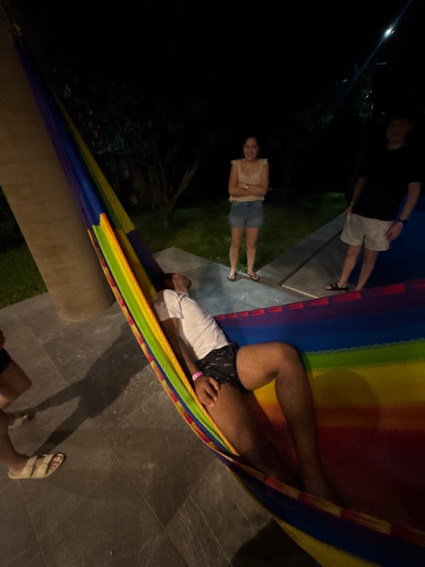 Nighttime hammock relaxation with friends in Puerto Escondido