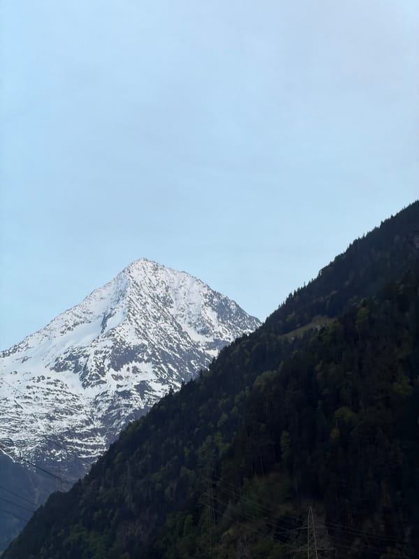 Clear skies over Alpine landscape captured in Erstfeld