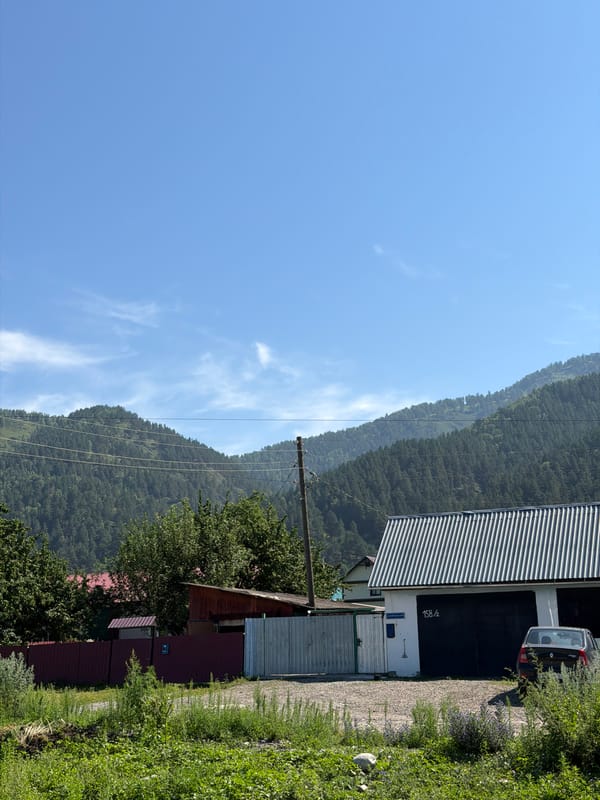 Rural Altai village life at the foot of a mountain