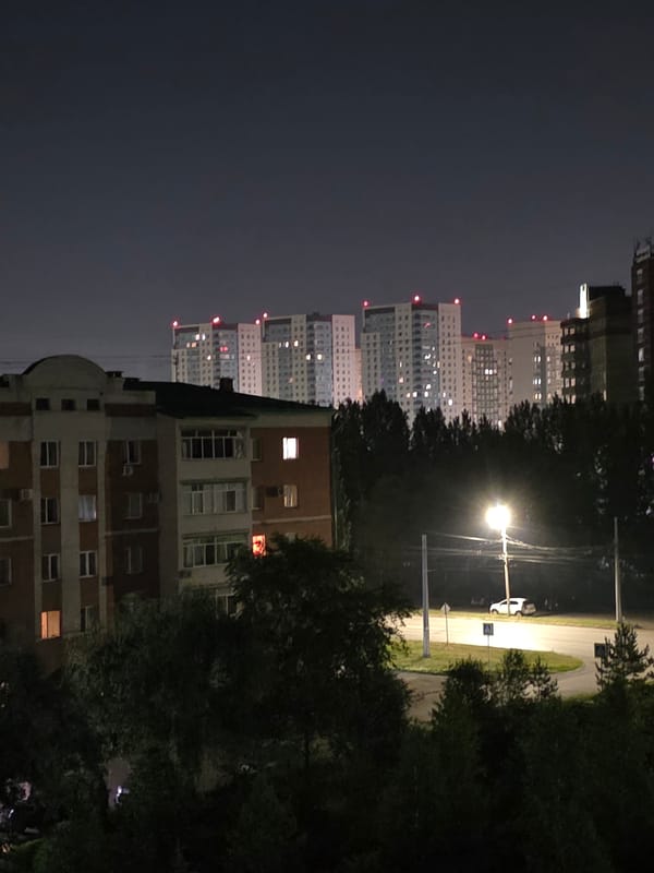 Cats, city nights, and a Porsche Design detail in Omsk