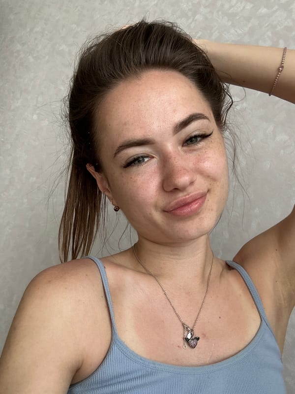 Woman takes bedroom selfie in early morning hours