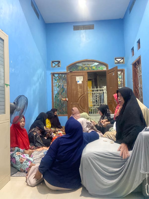 Women gather for social meeting in Gelam home