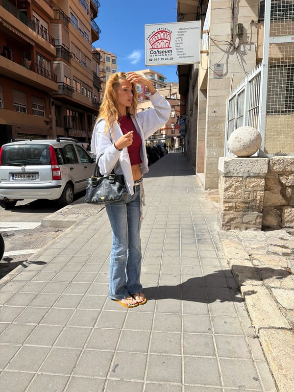 Woman observed on sidewalk in Alicante, Spain