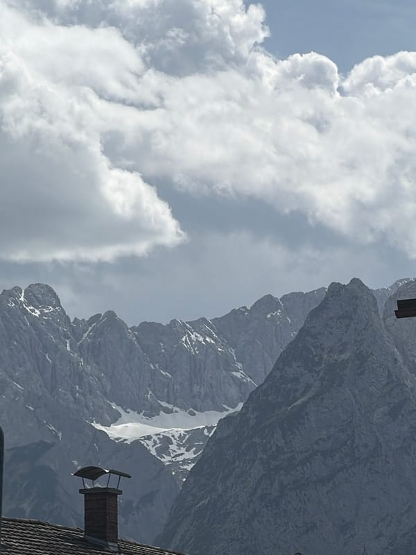 Mountain landscape with snow patches observed in Garmisch-Partenkirchen