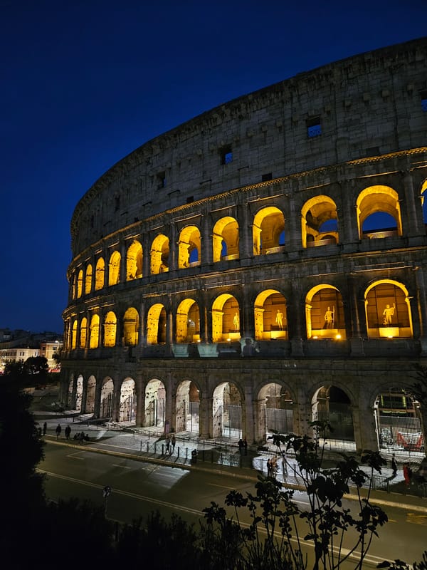 Nighttime illumination of Rome's Colosseum captured by witness