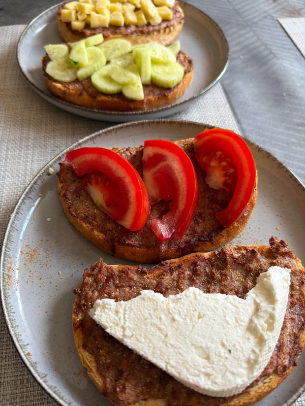 Open-faced sandwiches on a woven placemat in Sofia