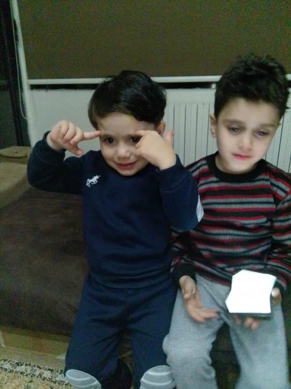 Children's daily moments captured in Syrian household