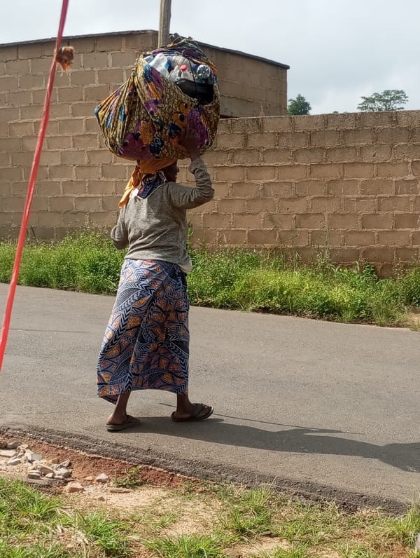 Street life and mobile payment terminals on a Jos road