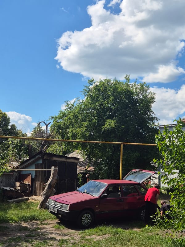 Summer morning in a small Ukrainian village: gardens, bikes, and blooms